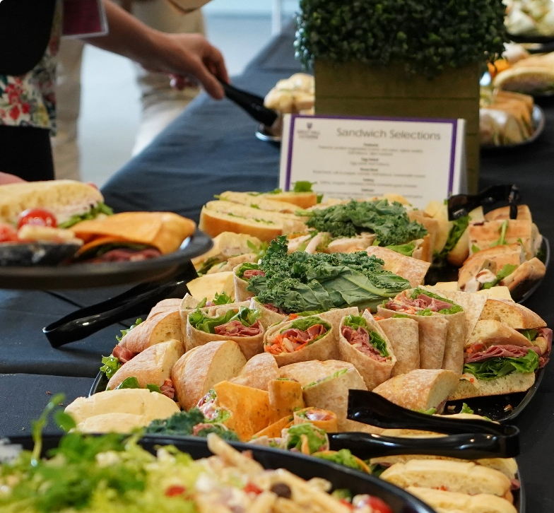 A buffet spread of sandwiches and wraps